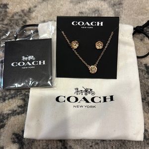 Coach necklace and earring set rose gold